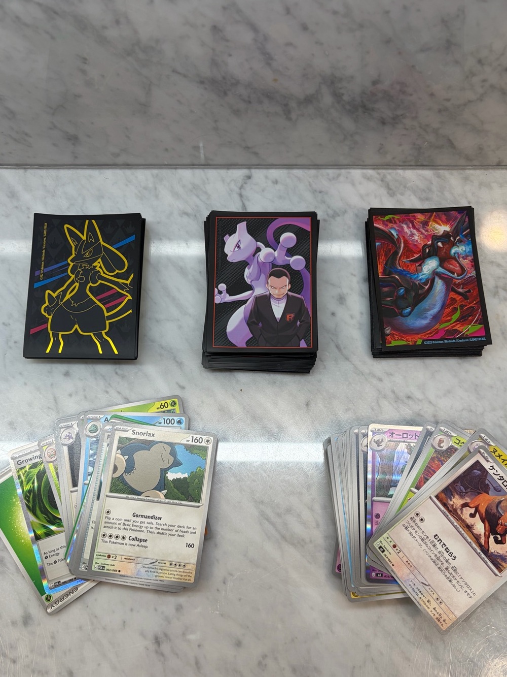 Pokémon Trading Card Lot – English & Japanese Cards + Sleeves
